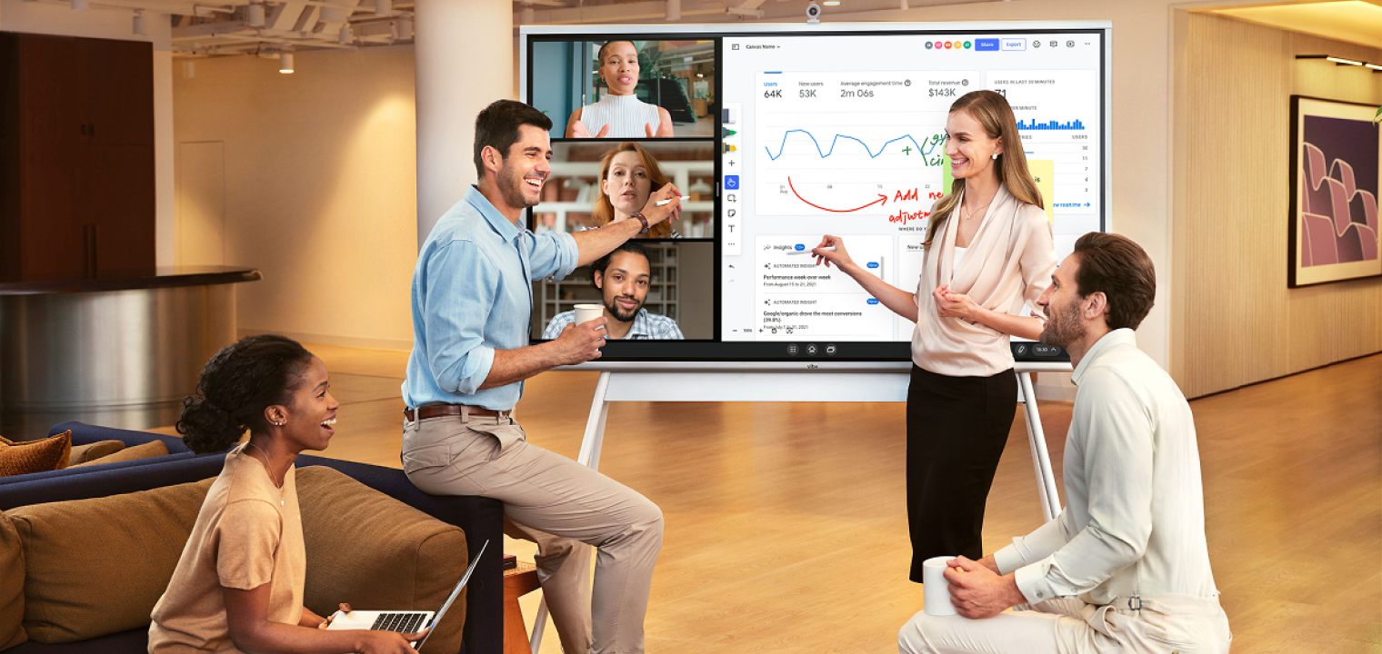 People using a Vibe Board to boost team communication in a hybrid meeting.